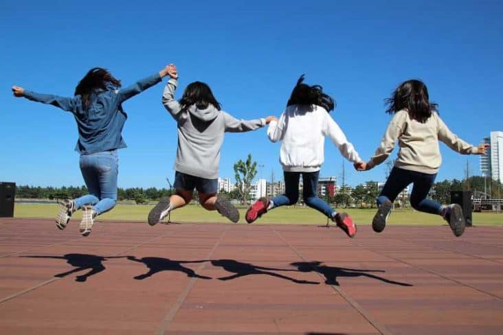 Students Jumping for Joy